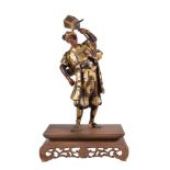 Yoshimitsu: A Japanese Parcel Gilt Bronze Figure of a Night Watchman