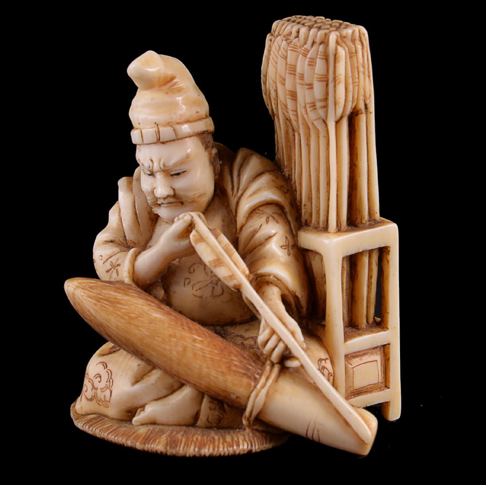 ϒ Sadamasa: A Japanese Ivory Okimono of a Seated Archer