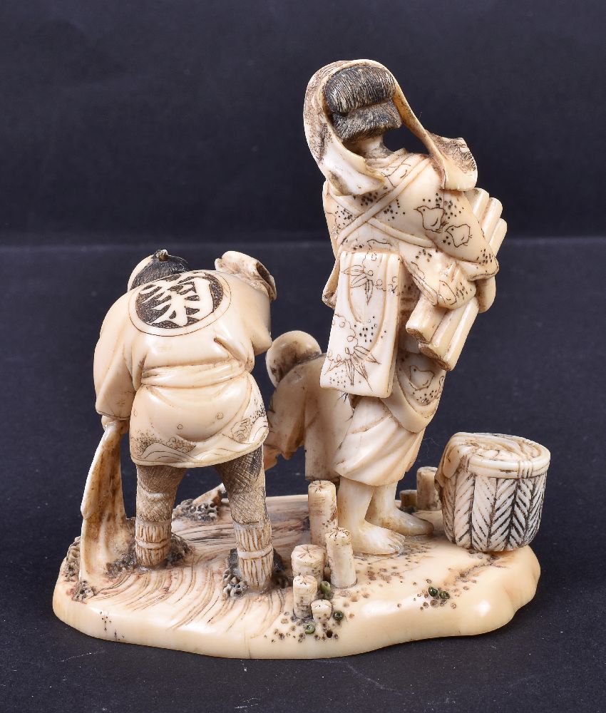 ϒ KIKKOSAI TOKUSAN: A Japanese Ivory Okimono depicting a family group - Image 4 of 4