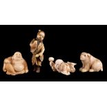 ϒ A Japanese Ivory Netsuke of Hotei