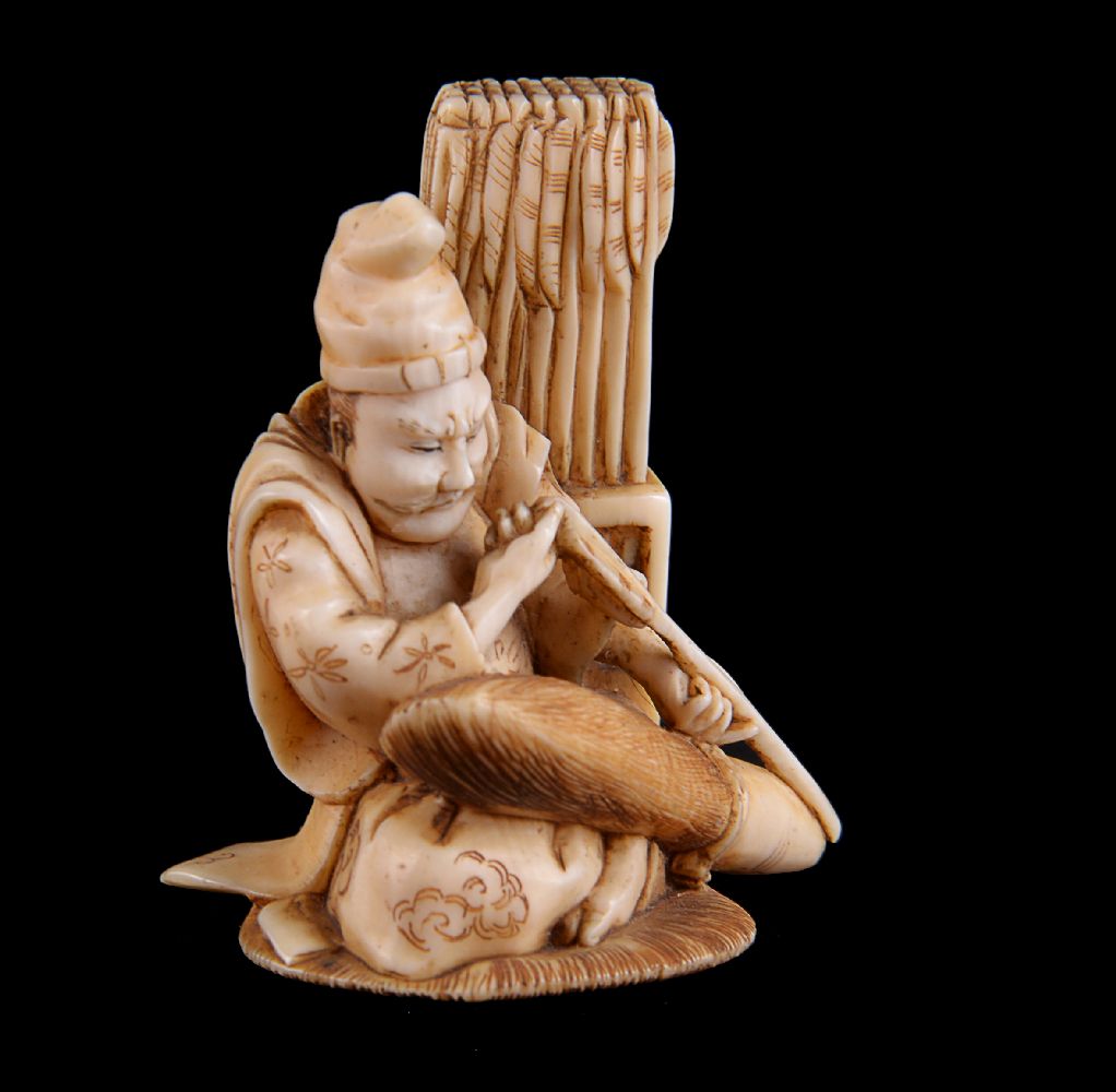 ϒ Sadamasa: A Japanese Ivory Okimono of a Seated Archer - Image 2 of 4