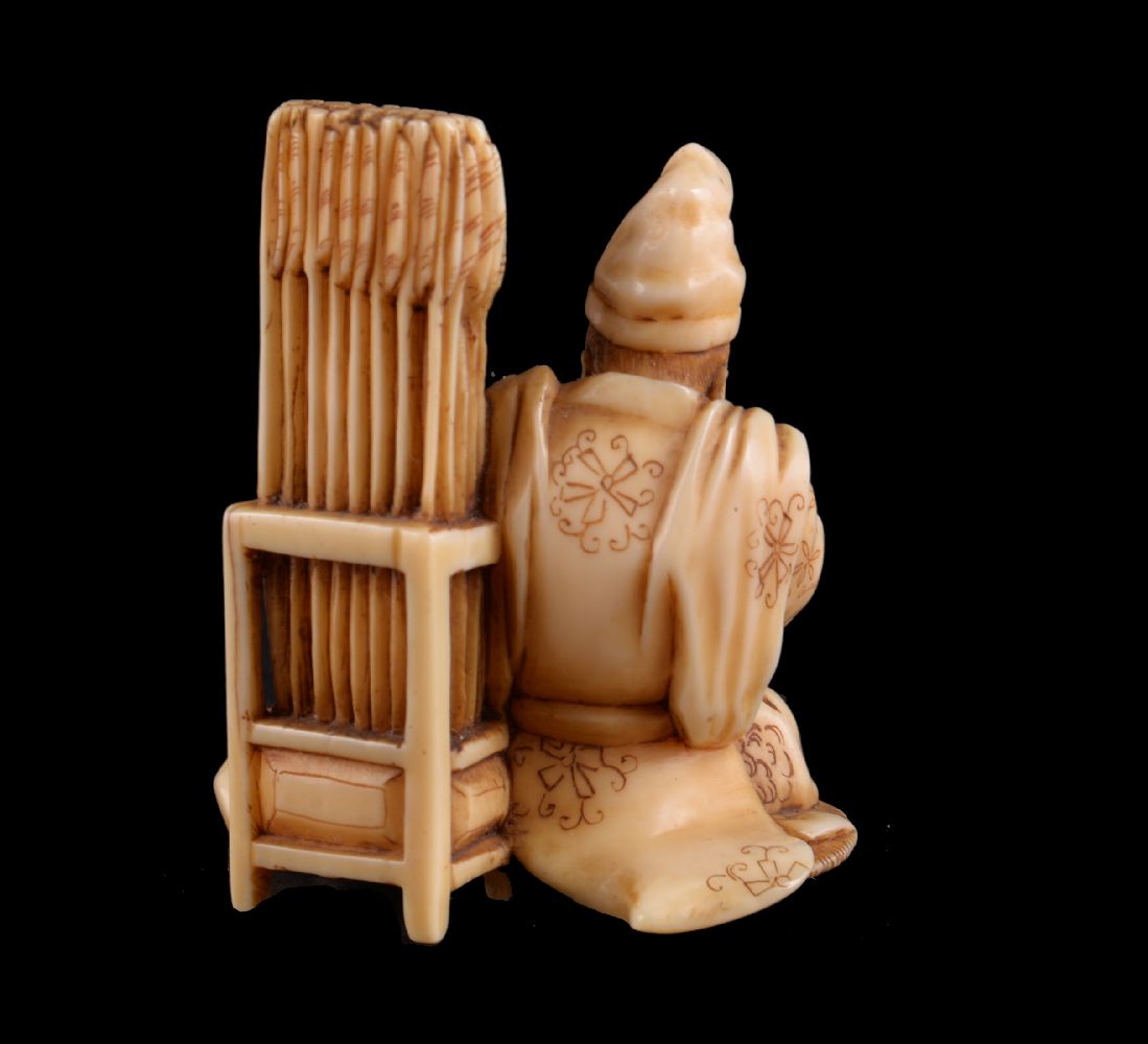 ϒ Sadamasa: A Japanese Ivory Okimono of a Seated Archer - Image 3 of 4