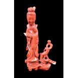 ϒ A Chinese coral carving a lady and bird