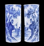 A pair of Chinese blue and white cylindrical vases