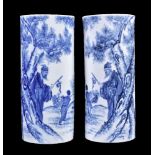 A pair of Chinese blue and white cylindrical vases