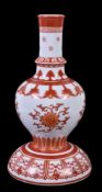 A Chinese iron-red decorated ‘holy water’ bottle vase