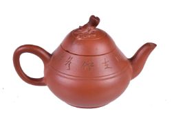 A Chinese inscribed Yixing teapot