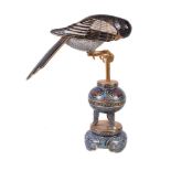 A Chinese cloisonné enamel magpie on a perch