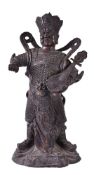 A Chinese gilt bronze figure of Dhṛtarāṣṭra