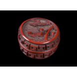 A small Chinese cinnabar lacquer circular box and cover