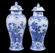 Two similar Chinese 'Shipwreck' blue and white vases and covers