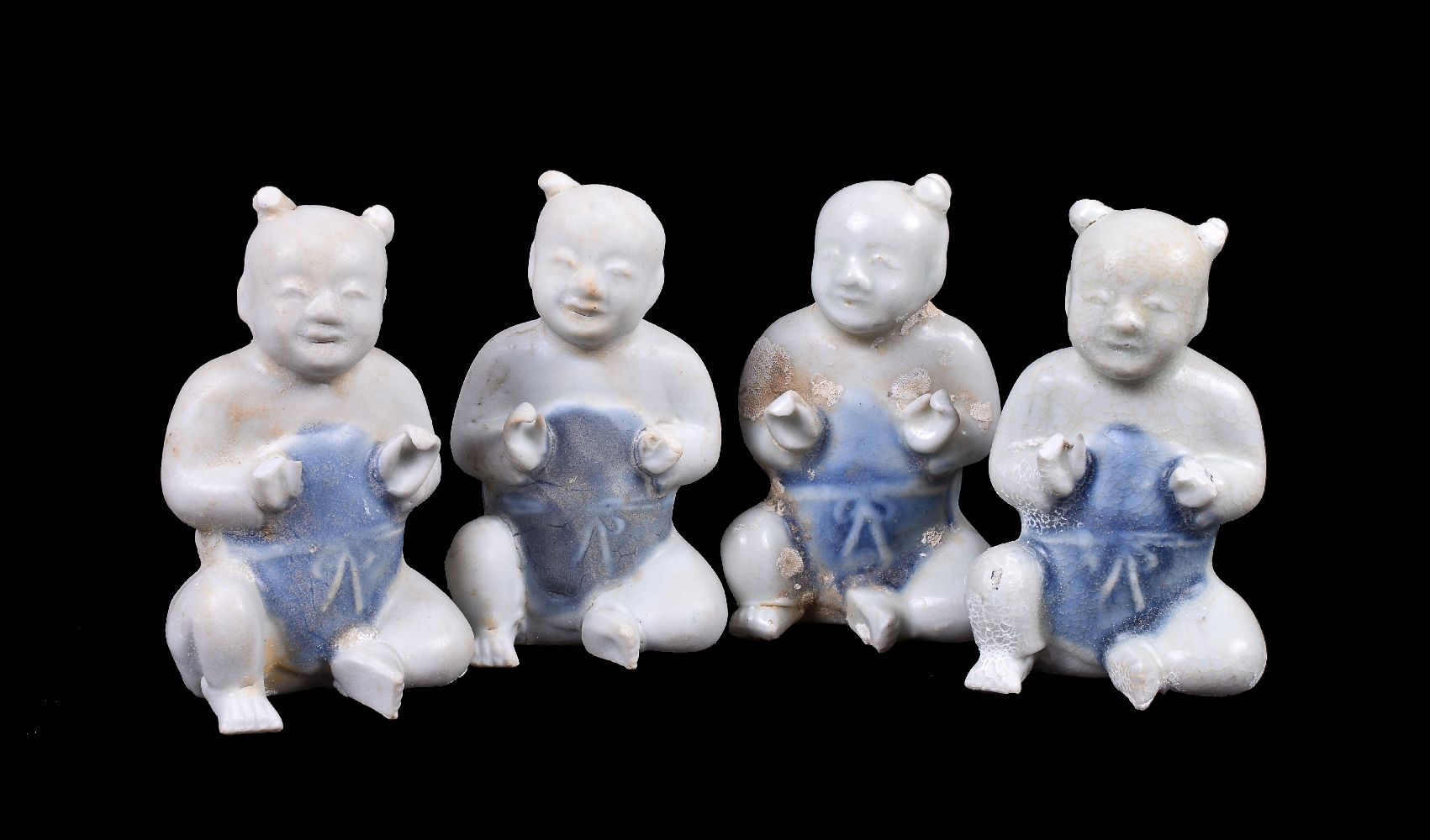 Four Chinese Ca Mau Shipwreck Figures of seated boys