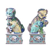 A large pair of 'Famille Verte' Buddhist lions