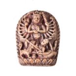 ϒ A small Nepalese ivory relief of Durga slaying the Buffalo Demon