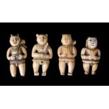 ϒ A group of four Chinese carved ivory toggles of boys