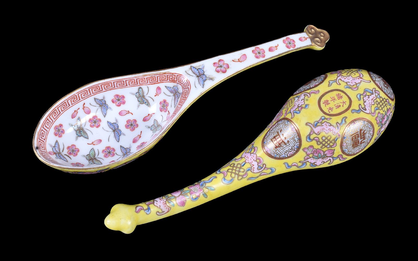 A pair of Chinese 'Famille-Rose' and iron-red yellow ground spoons