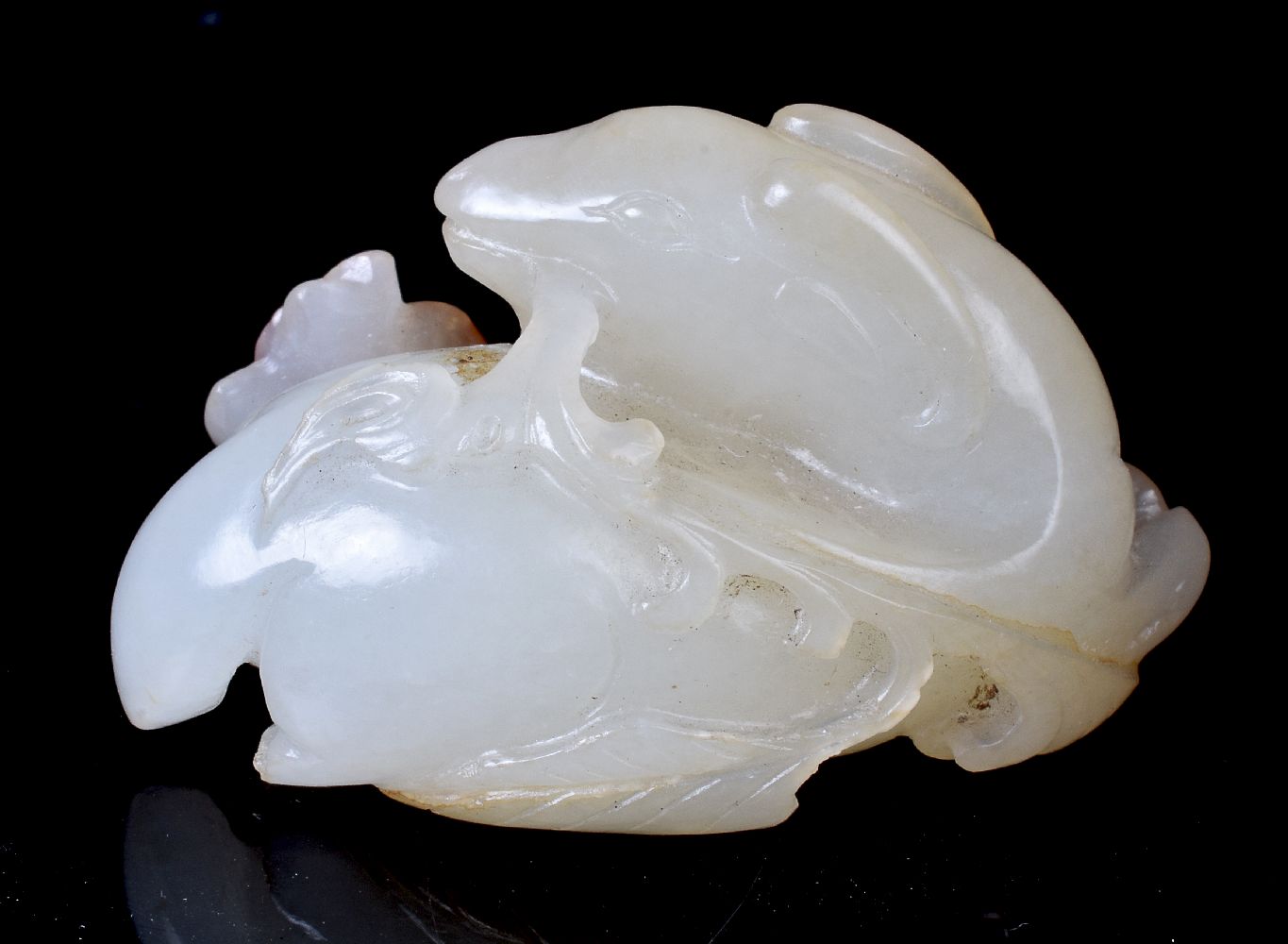 A Chinese white and russet jade ‘ram’ carving - Image 2 of 4