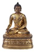 A bronze figure of Buddha