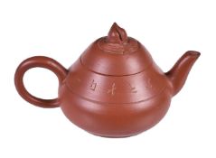 A Chinese inscribed Yixing teapot