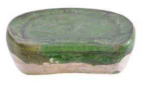 A Chinese green-glazed kidney shaped pillow