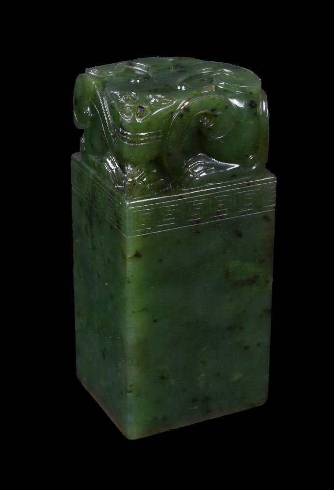 A Chinese spinach jade lion seal