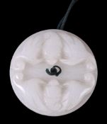 A Chinese white jade 'bat' roundel