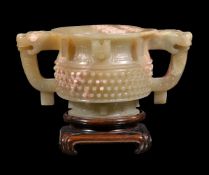 A Chinese celadon and white jade two handled cup