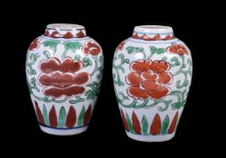 A small pair of Chinese Transitional 'Famille Verte' vases