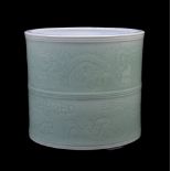 A Chinese celadon-glazed ‘dragon’ brush pot