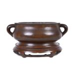 A Chinese bronze bombe censer and stand