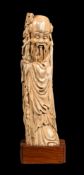 ϒ A Chinese ivory standing figure of Shoulao