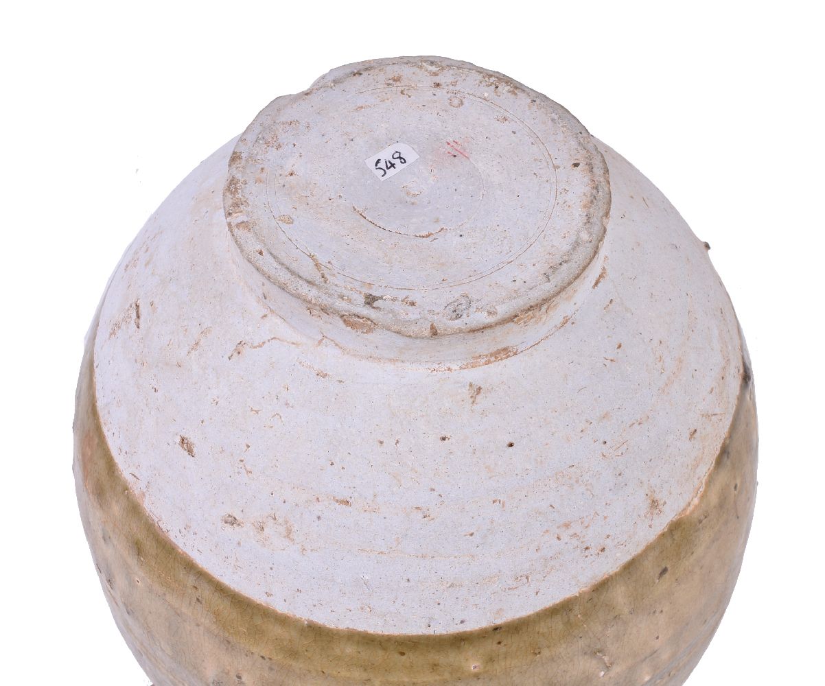 A Chinese celadon glazed pottery vase - Image 3 of 3