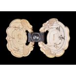 ϒ A pair of Chinese ivory lock pendants mounted as a buckle