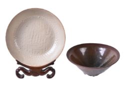 A Chinese celadon moulded 'Fish' dish