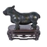 A Chinese gold and silver-inlaid bronze tapir