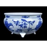 A Chinese blue and white tripod censer