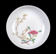 A small Chinese ruby ground 'prunus' dish