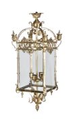 A brass and glazed four light hall lantern in the manner of Victorian examples