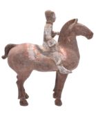 A Chinese painted terracotta model of a horse rider