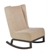 An upholstered rocking chair