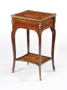 ϒ A French kingwood, specimen marquetry and gilt metal mounted occasional table