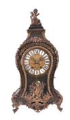 A French hardwood and brass inlaid mantel clock in Louis XV style