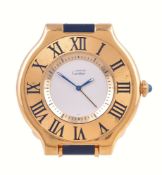 Cartier, Must de Cartier, a gilt metal travel alarm clock