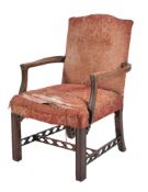 A mahogany open armchair in George III style