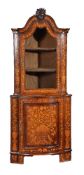 A Dutch walnut and marquetry inlaid corner cupboard