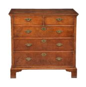 A walnut, burr walnut and featherbanded chest of drawers