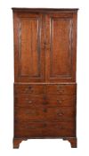 A George III oak press cupboard on chest