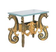A carved giltwood and painted console table