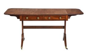 ϒ A Regency mahogany and ebony strung sofa table