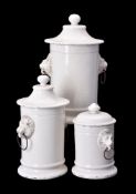 A graduated set of three white pottery jars and covers in the French 19th century pharmaceutical sty